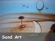 Disegni su sabbia o sand art